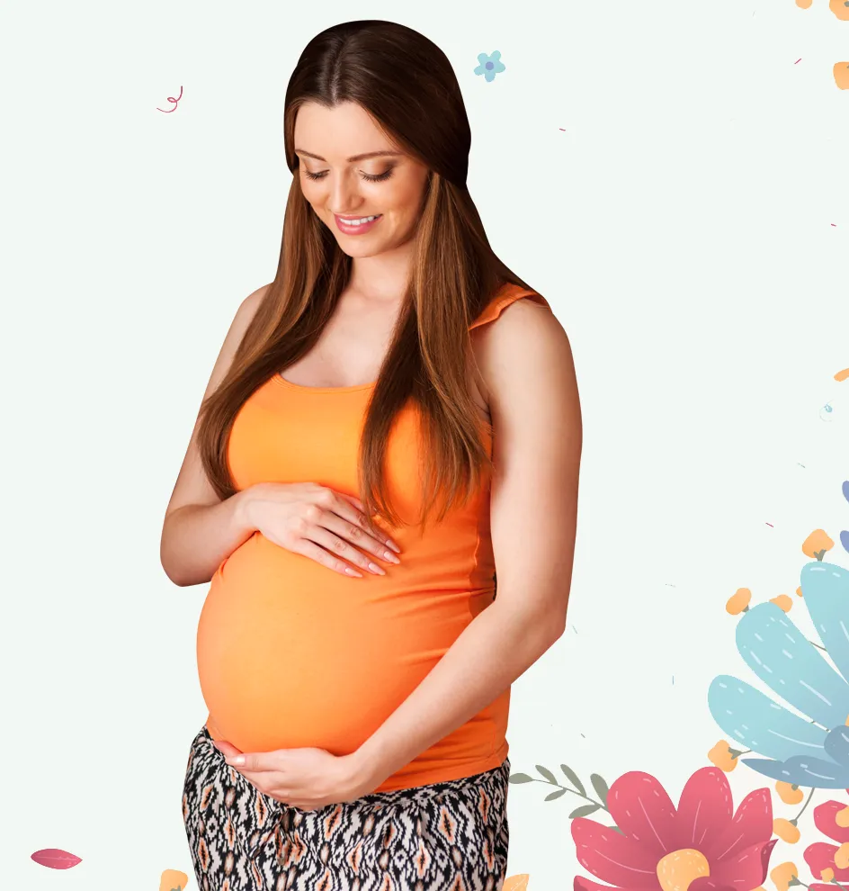 Expectant mother cradling her baby bump — obstetric and pregnancy care at Hiba Women's Clinic, Tirunelveli